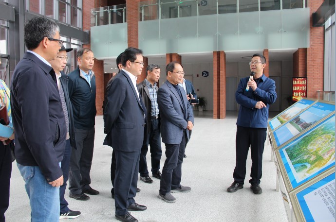 重庆市政协副主席吴刚、屈谦率队调研重庆研究院